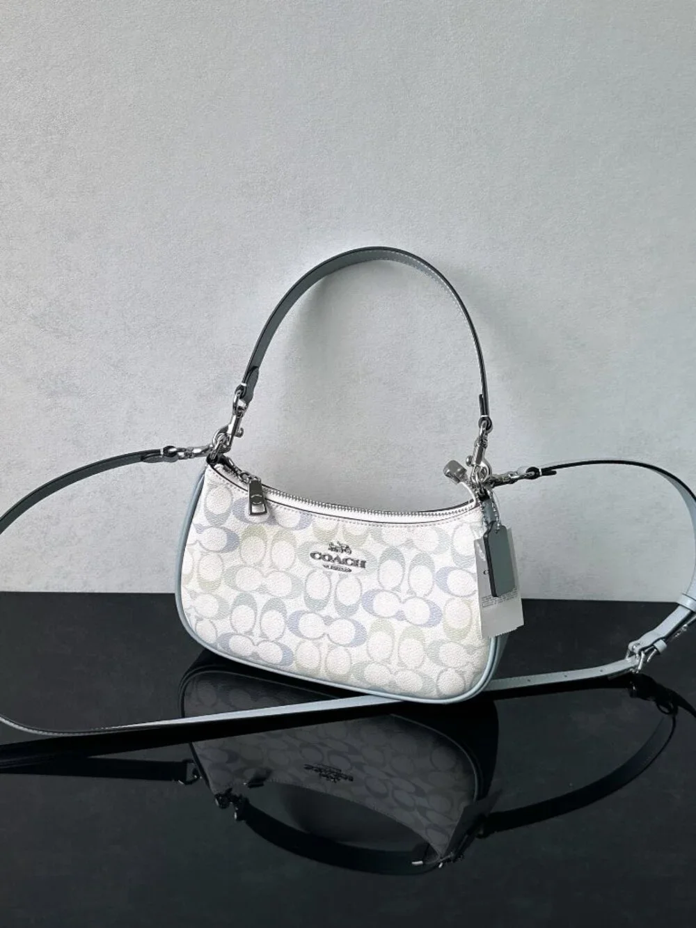 Coach signature coated‑canvas